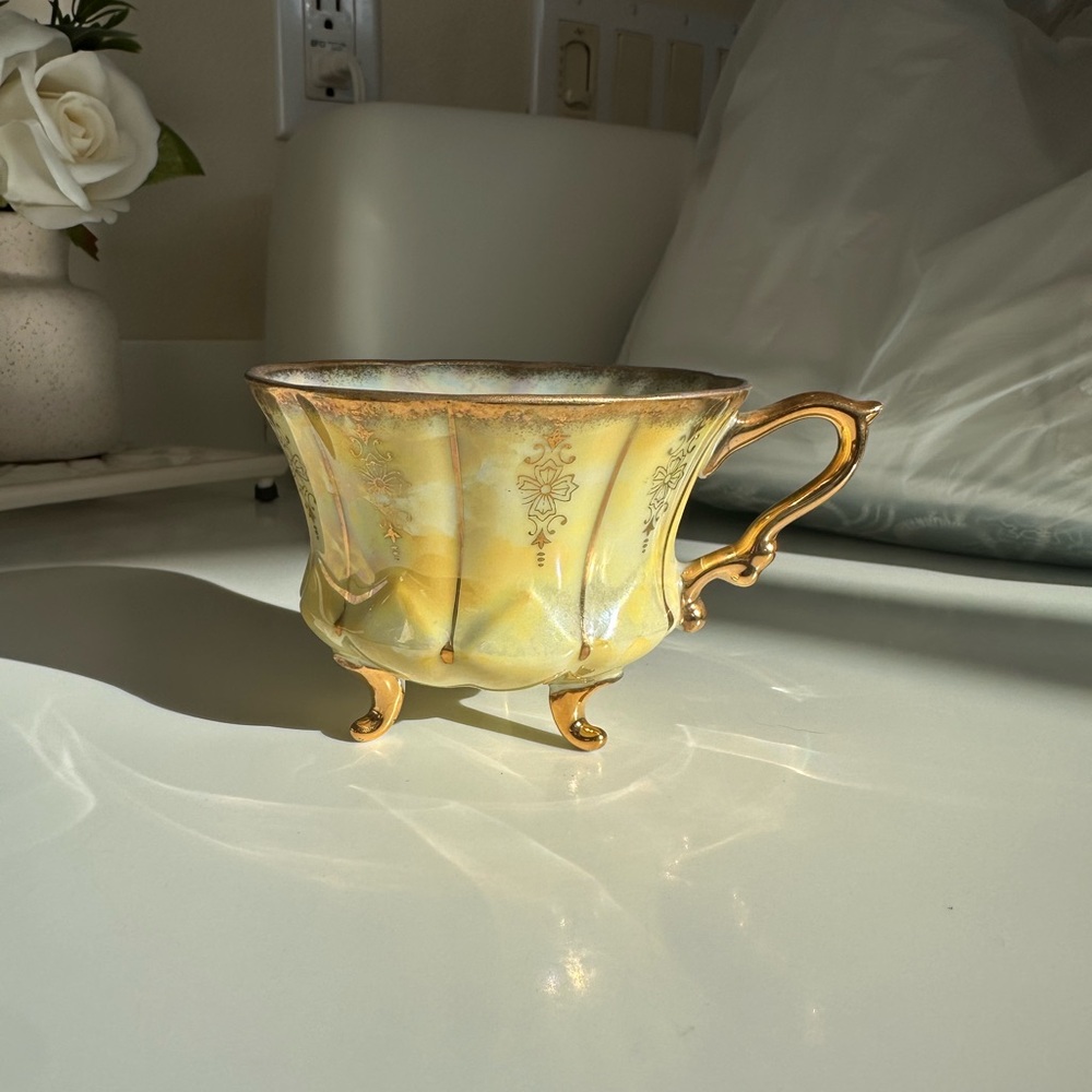vintage 3 footed iridescent Yellow and Gold Teacup Royal Sealy OR BEST OFFER